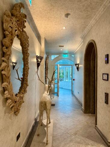 The Spa at Ashford Castle in County Mayo showing a luxury spa day in Ireland with Augustinus Bader facials, spa facilities, mosaic pool, and five-star hotel surroundings